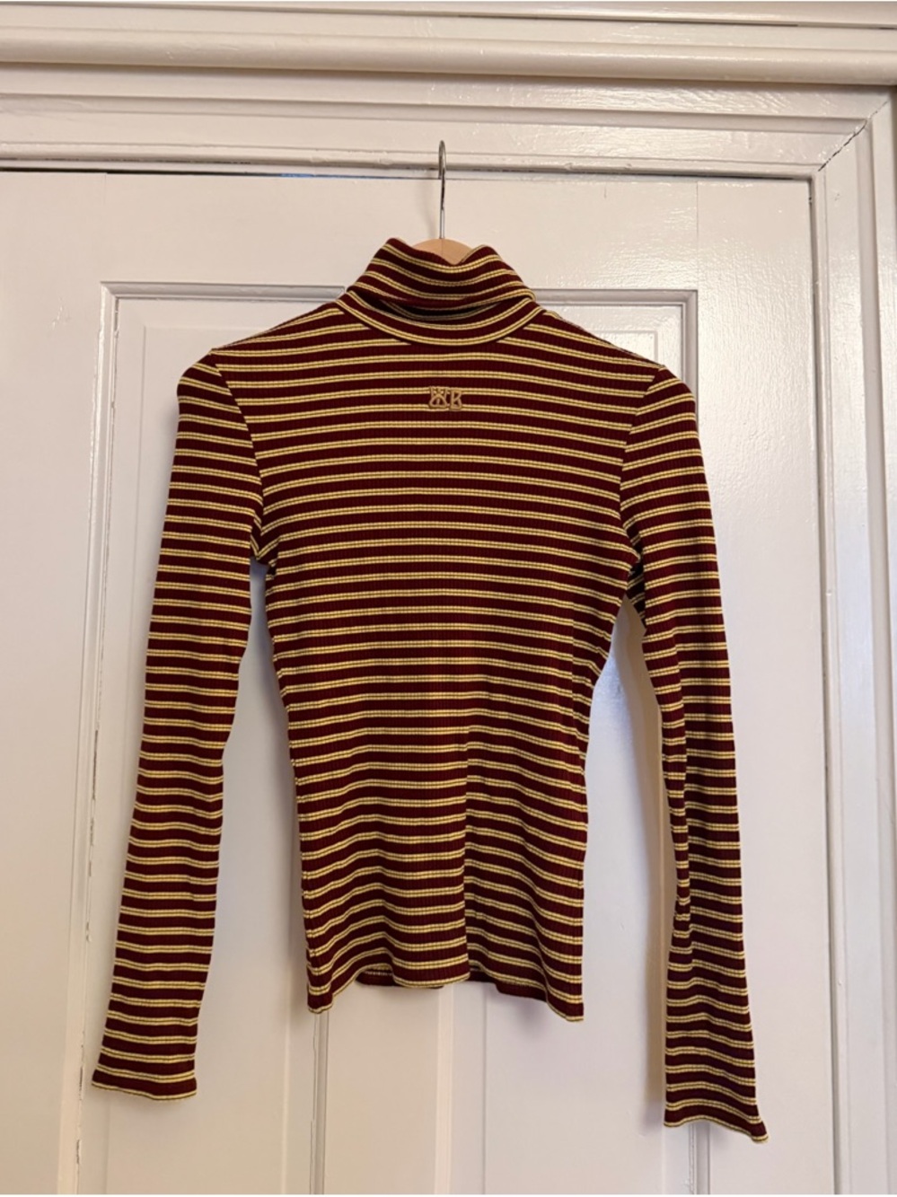 Wales Bonner Sonic striped ribbed stretch-jersey turtleneck top